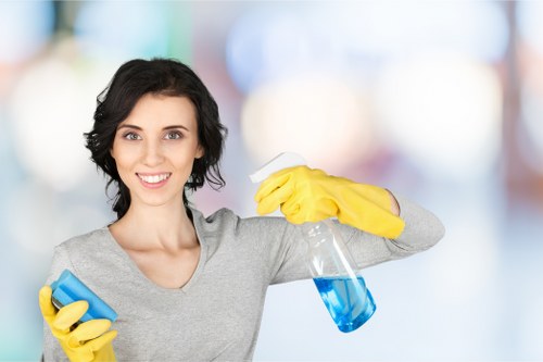 Cleaner using protective gloves during carpet cleaning tasks