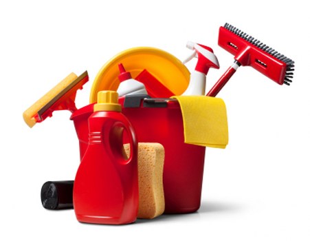 Technician managing carpet cleaning hose and wet floor precautions